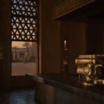 Saudi specialty coffee house interior at dusk, homegrown franchise brands in Saudi Arabia 2026